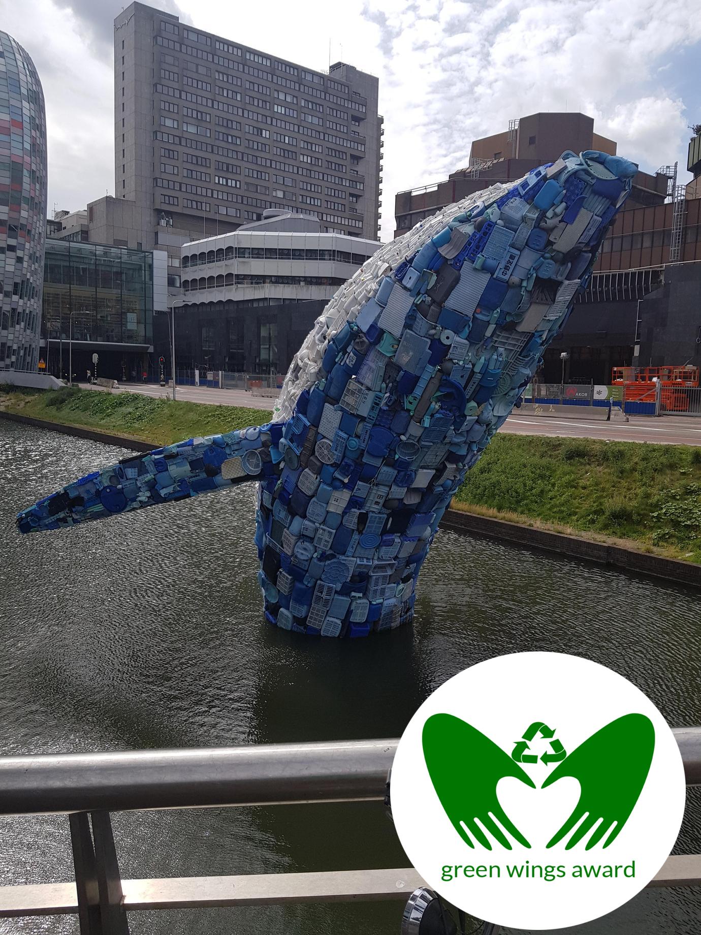 plastic whale green wings