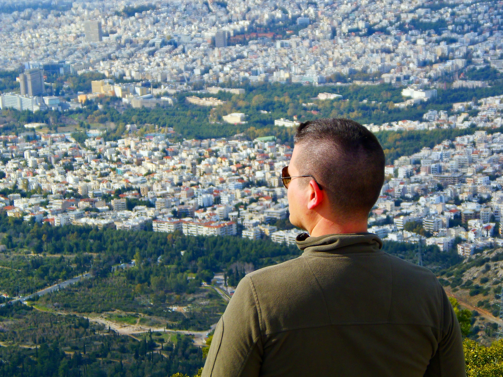 Is it more sustainable to live in a city or the suburbs? 

Photo by Feri & Tasos on Unsplash