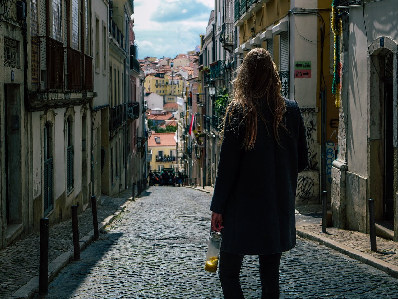 Slow travel - tourist walking through town